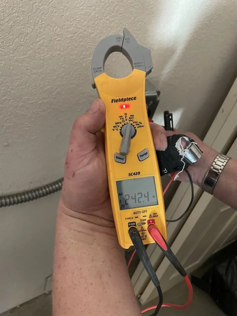 Voltage testing with clamp meter during Recessed Lighting Installation in Marbletown